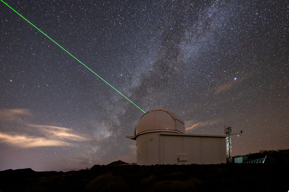 ESA's laser ranging station in Tenerife aims its green laser to the sky