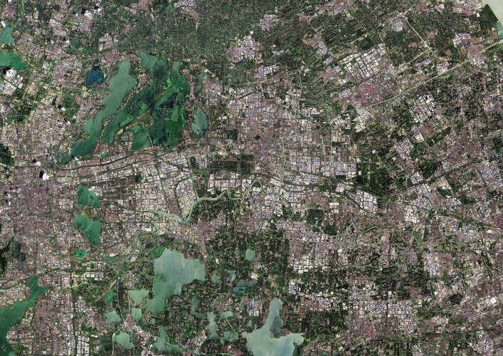 This Copernicus Sentinel-2 image captures the intricate blend of natural, rural and urban landscapes around Kunshan, a city in eastern China. 